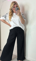 WIDE LEG PLISSÉ PANTS BLACK